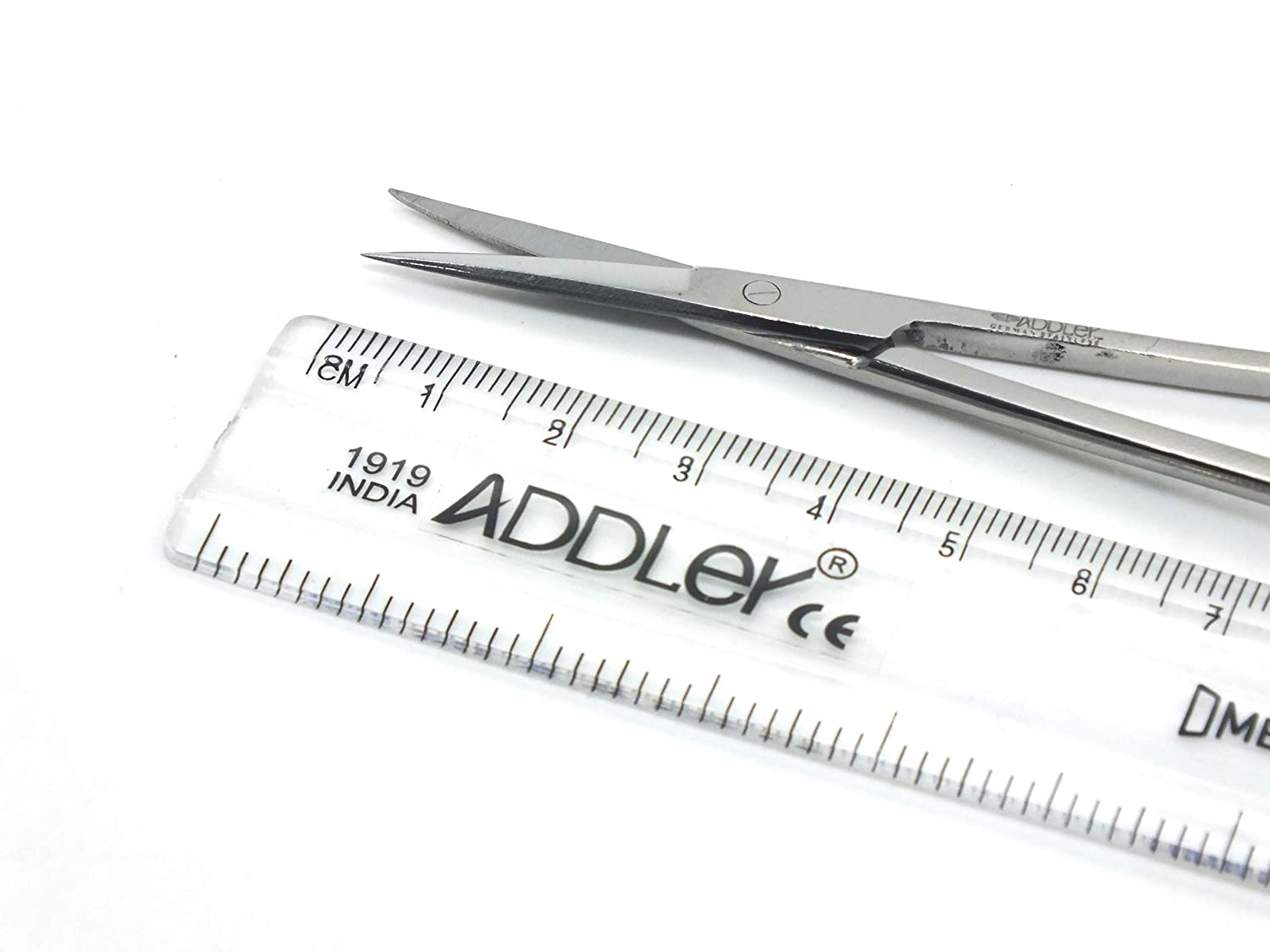 ADDLER GUM SURGERY  GOLDEN SCISSOR IRIS.